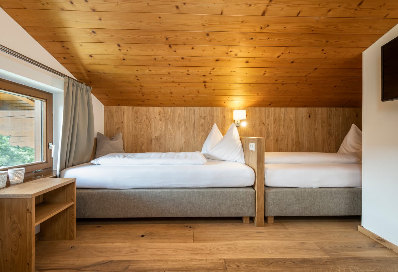 Getrennte Betten im Zweibettzimmer in der Ferienwohnung am Untersüßgut